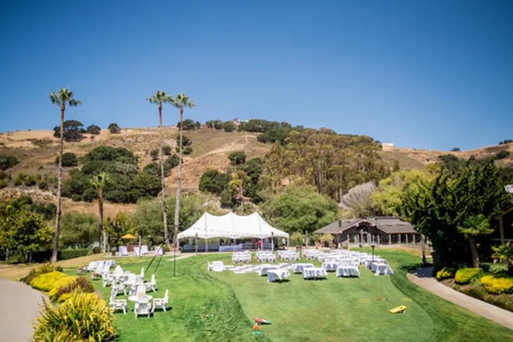 Tent on golf course for wedding reception